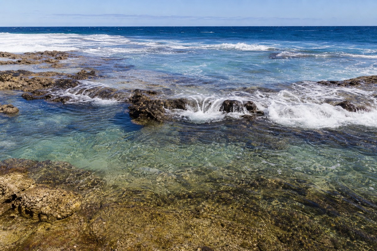 The natural rock pools at Champagne Pools, North Point
